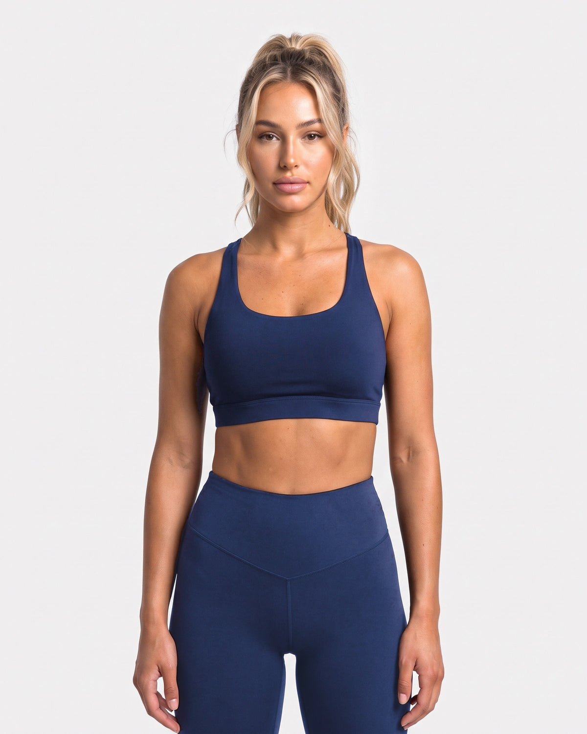OMNÉA Cross Back Sports Bra in OMNÉA Blue – Vorderansicht